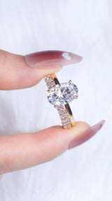 Oval Set: Valorie - Oval hidden halo on plain band Moissanite engagement ring with Ollie Oval half eternity wedding band set