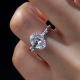 Elena - Oval and Tapered Baguette Three Stone Moissanite Engagement Ring