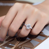 Elena - Oval and Tapered Baguette Three Stone Moissanite Engagement Ring