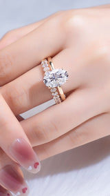 Oval Set: Valorie - Oval hidden halo on plain band Moissanite engagement ring with Ollie Oval half eternity wedding band set