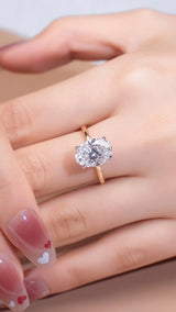 Cecilia - Oval Hidden Pave Basket on Plain Band Two Tone Moissanite Engagement Ring