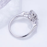 Elena - Oval and Tapered Baguette Three Stone Moissanite Engagement Ring