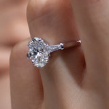 Elena - Oval and Tapered Baguette Three Stone Moissanite Engagement Ring