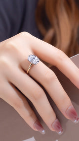 Cecilia - Oval Hidden Pave Basket on Plain Band Two Tone Moissanite Engagement Ring