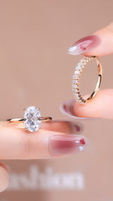 Oval Set: Valorie - Oval hidden halo on plain band Moissanite engagement ring with Ollie Oval half eternity wedding band set