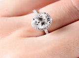 Oval Halo on Pave Band Moissanite Engagement Ring with Accent