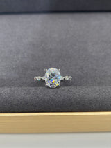 Amelia - Oval Hidden Halo on Marquise Band Moissanite Engagement Ring