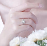 Emerald Halo on Pave Band Moissanite Engagement Ring