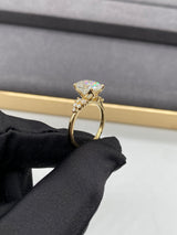 Lilian - Oval Petal Prongs Cluster Side Stone Moissanite Engagement Ring