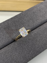 Kayla - Emerald Cut Open Hidden Halo on Plain band Moissanite Engagement Ring