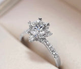 Elsa - Round Snowflake Moissanite Engagement Ring with Heart Prongs