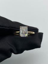 Kayla - Emerald Cut Open Hidden Halo on Plain band Moissanite Engagement Ring