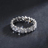 Chloe - Trapezoid Round Moissanite Eternity Wedding Band