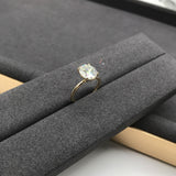 Valorie - Oval Hidden Halo on Plain Band Moissanite Engagement Ring