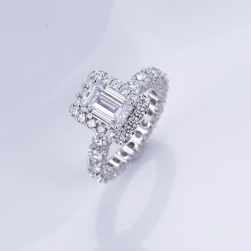 Emerald cut with halo on accent eternity band Moissanite Engagement Ring