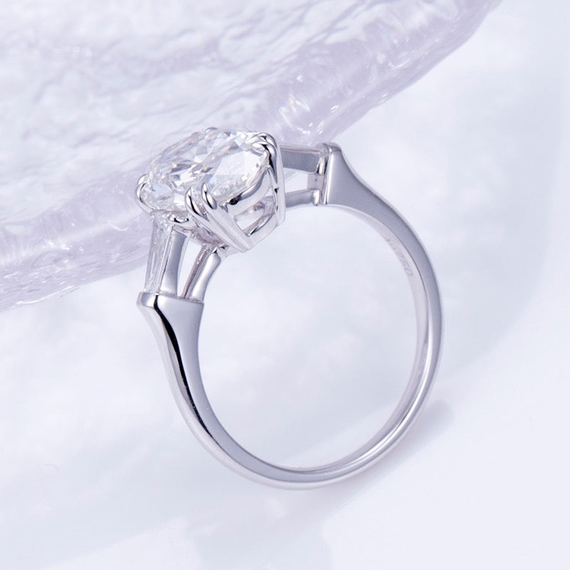 Elena - Oval and Tapered Baguette Three Stone Moissanite Engagement Ring