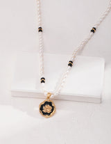 Pearl and Black Onyx Necklace with Black Drip Glaze Pendant