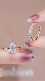Oval Set: Valorie - Oval hidden halo on plain band Moissanite engagement ring with Ollie Oval half eternity wedding band set