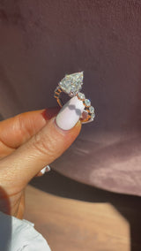 Pear Petal Prongs on Pear Side Stone Band Moissanite Engagement Ring