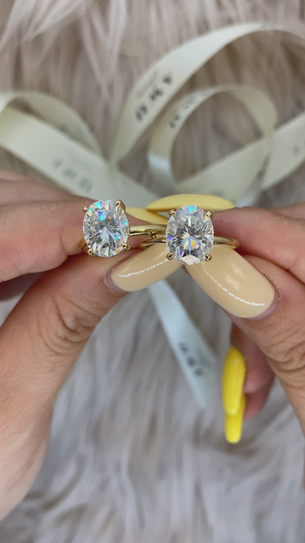 Valorie - Oval Hidden Halo on Plain Band Moissanite Engagement Ring