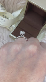 Pear Cut with Hidden Halo on Pave Band Moissanite Engagement Ring