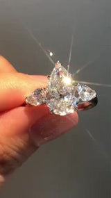 Pear Cut Three Stone Plain Band Moissanite Engagement Ring