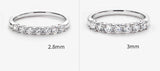Nora - 7 Round Stone Moissanite Wedding Band