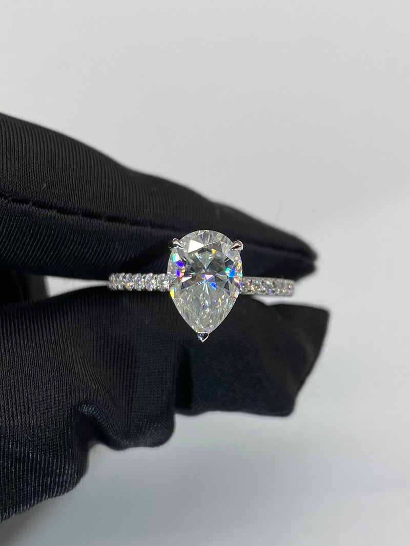 Pear Cut with Hidden Halo on Pave Band Moissanite Engagement Ring