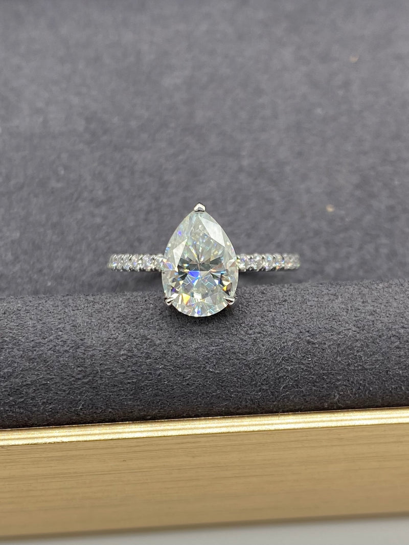 Pear Cut with Hidden Halo on Pave Band Moissanite Engagement Ring